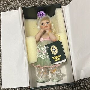 Geppeddo Collector Series Porcelain Doll- Aimee with Green Dress